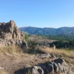Rock formations and open countryside at Kokino